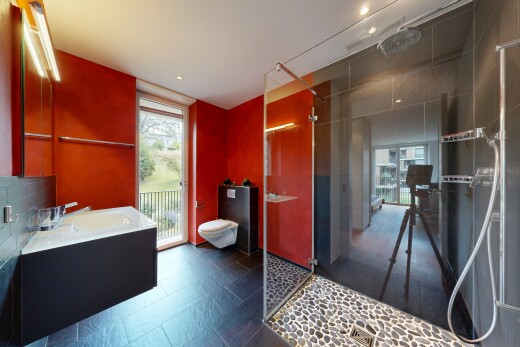 bathroom with a stall shower, vanity, and recessed lighting