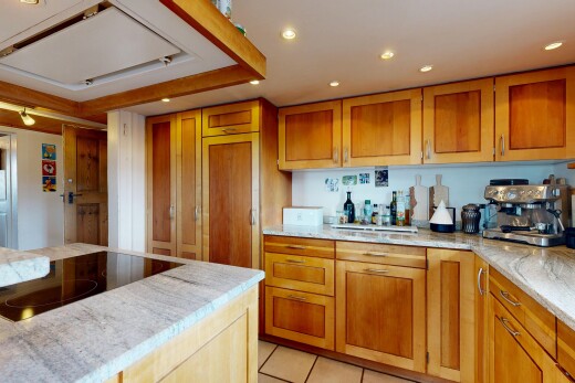 küche mit light countertops, recessed lighting, einbauleuchten, light floor, und herd