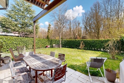 terrace with outdoor dining area, a patio, and a fenced backyard
