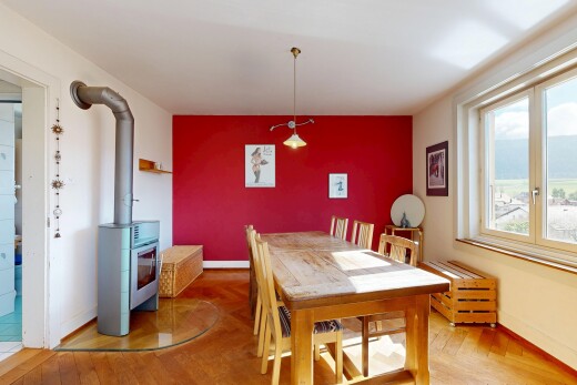 salle à manger avec accent wall, mur d'accent, drywall, cloison sèche, et inside property