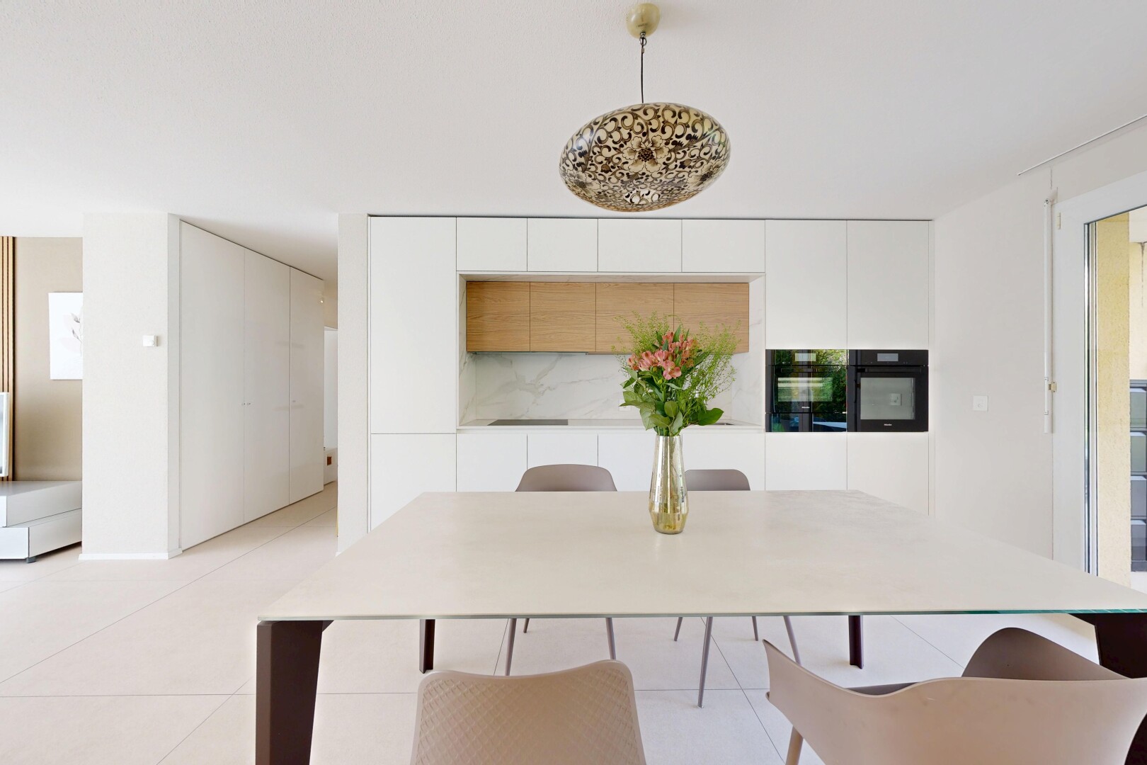 dining area featuring light tile patterned floors