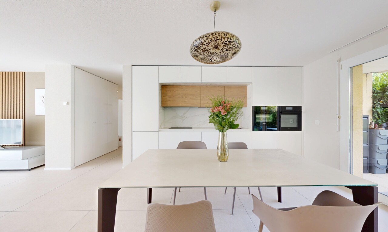 dining area featuring light tile patterned floors