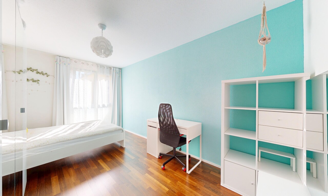 room with wood finished floors and baseboards