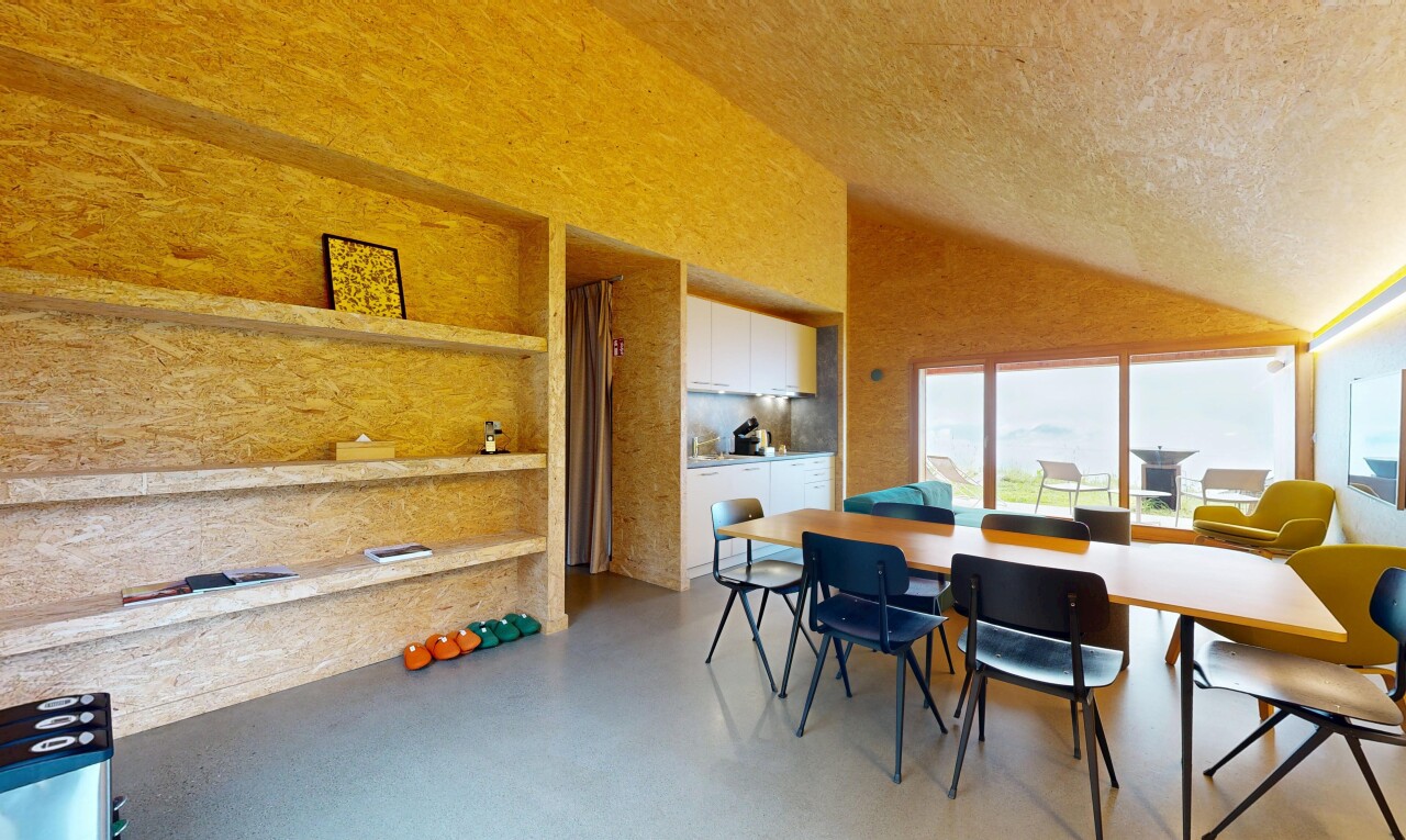 esszimmer mit inside property, natürliches licht, natural light, finished concrete floor, und dachschräge