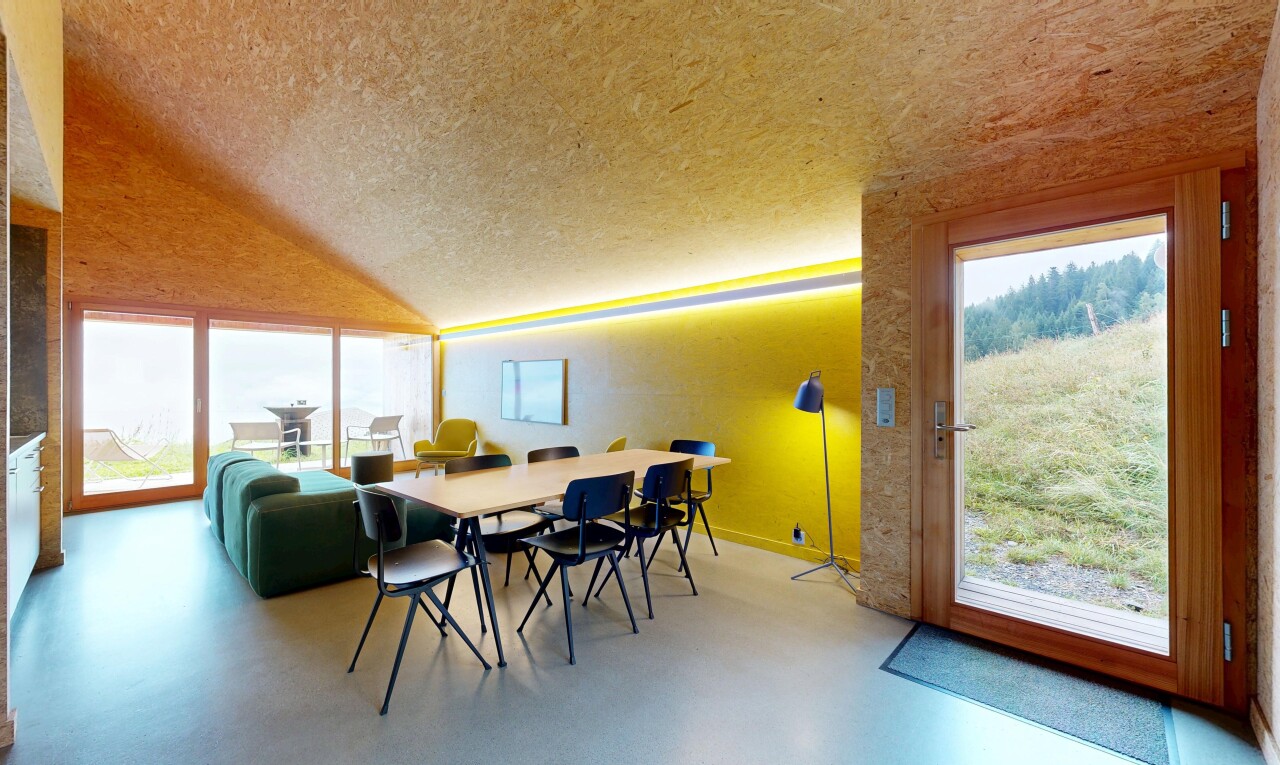 esszimmer mit inside property, natürliches licht, natural light, finished concrete floor, und dachschräge