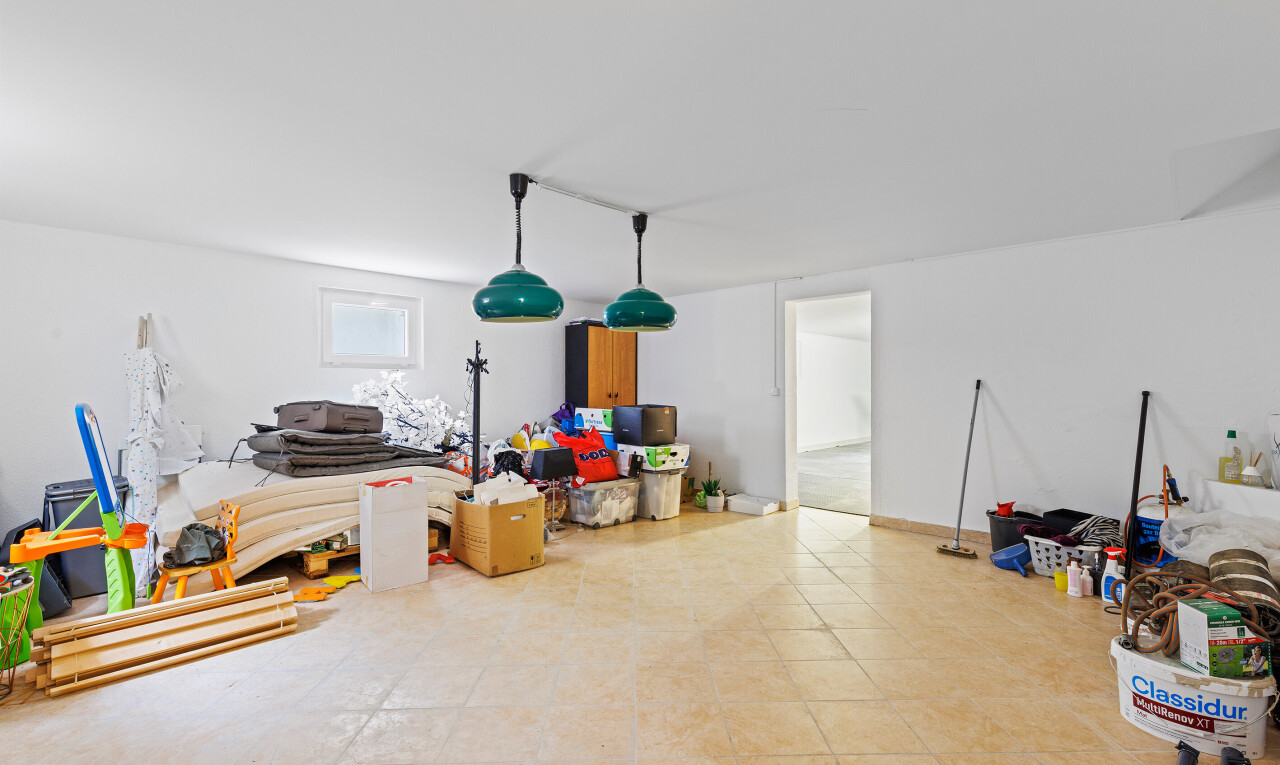 living room with tile patterned floors