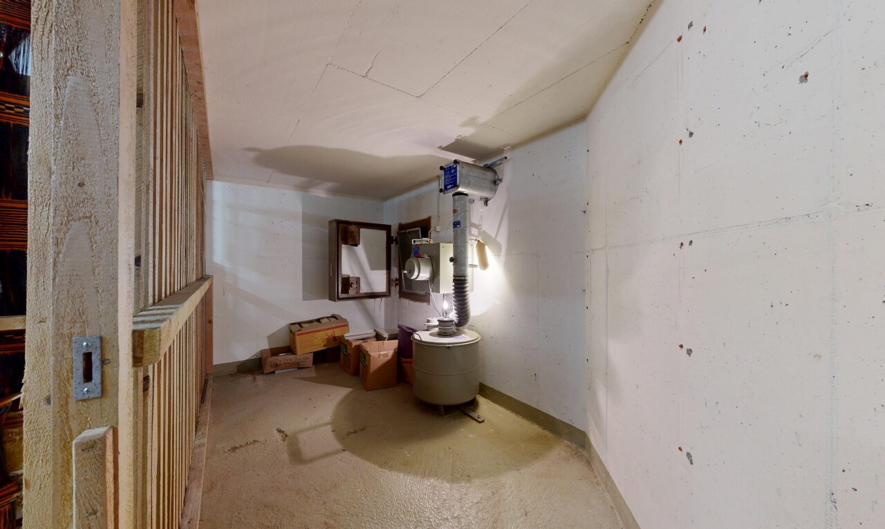 bathroom with concrete flooring and vanity