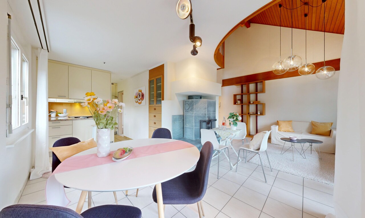 dining area with light tile patterned flooring and a vaulted wooden ceiling