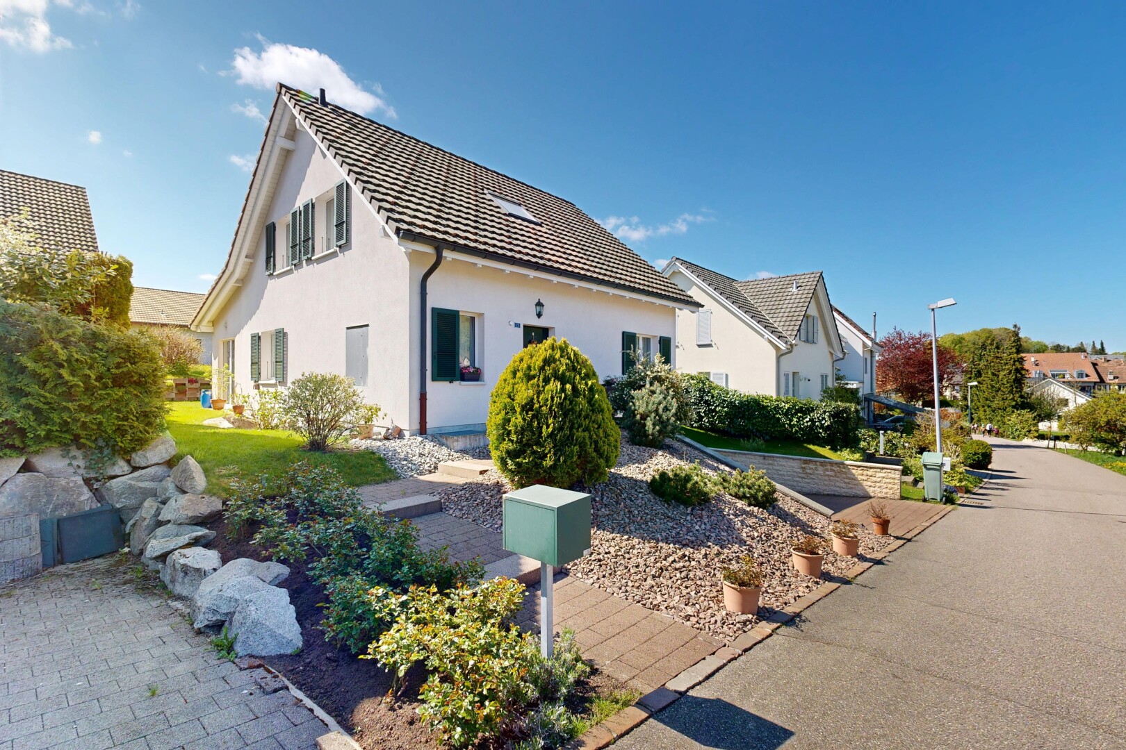 façade avec day time, property visible, et bardage en stuc