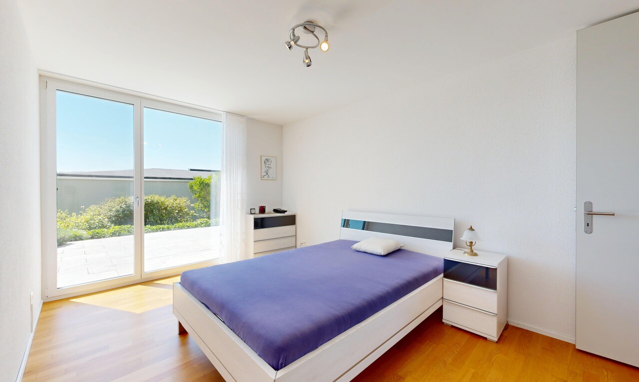 room featuring light wood-type flooring and access to exterior