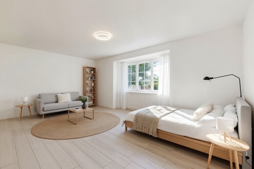 chambre avec cloison sèche, drywall, sol en finition bois, wood finish floor, et inside property