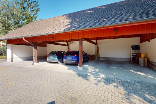 espace extérieur avec abri de voiture détaché