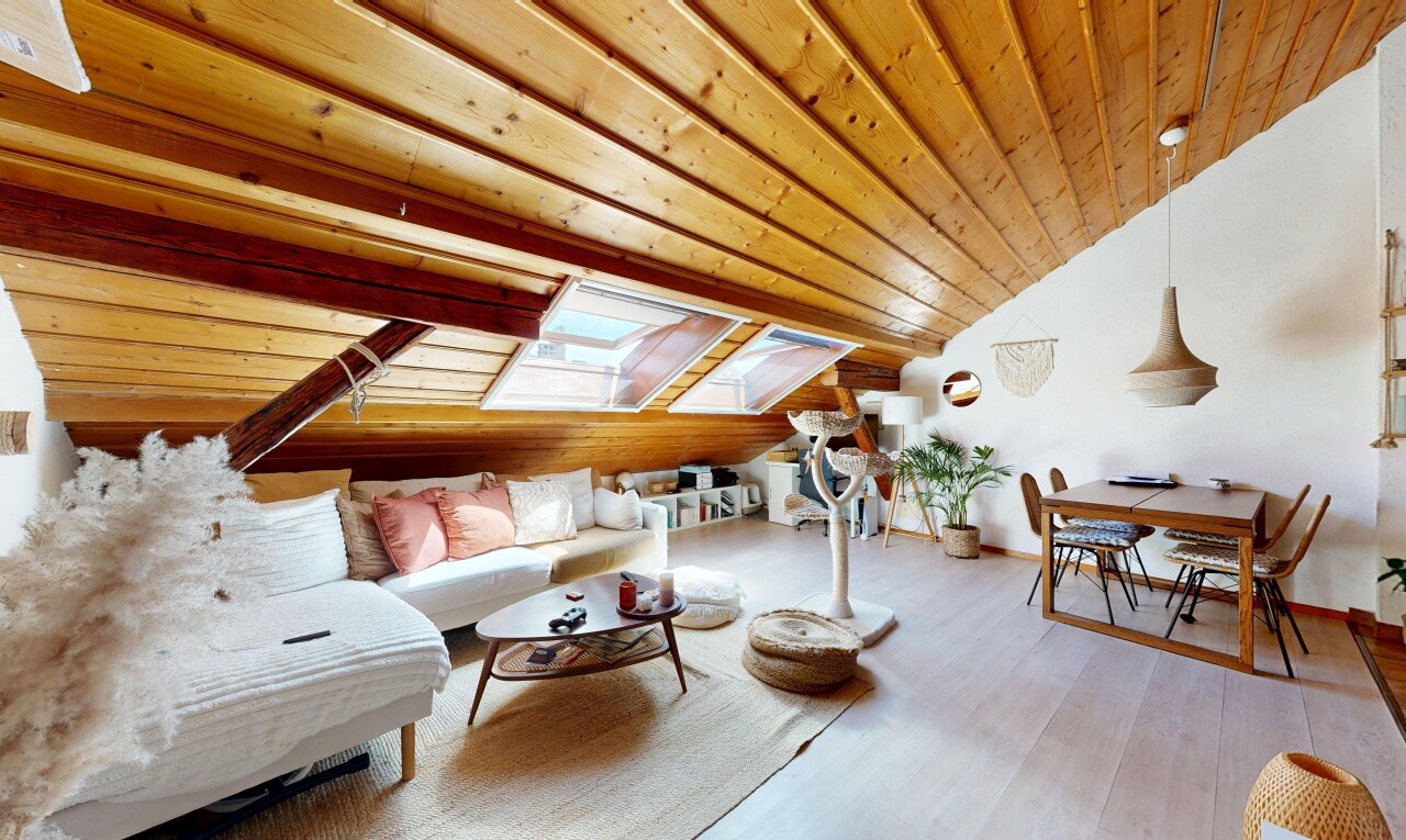 living / dining area featuring a vaulted wood ceiling, pendant lighting, and light wood-style floors