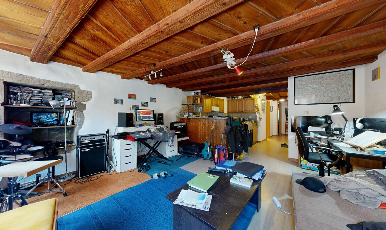 office with a wood ceiling with exposed beams