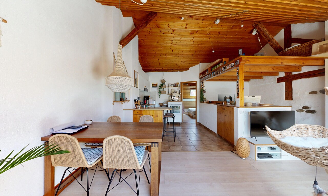 dining area with a vaulted wood ceiling