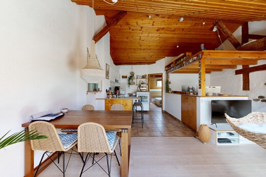dining area with a vaulted wood ceiling