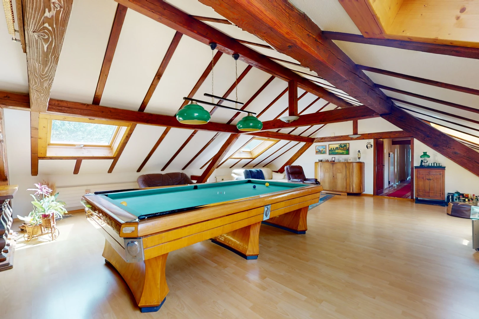 recreation room with vaulted ceiling with beams and wood-type flooring