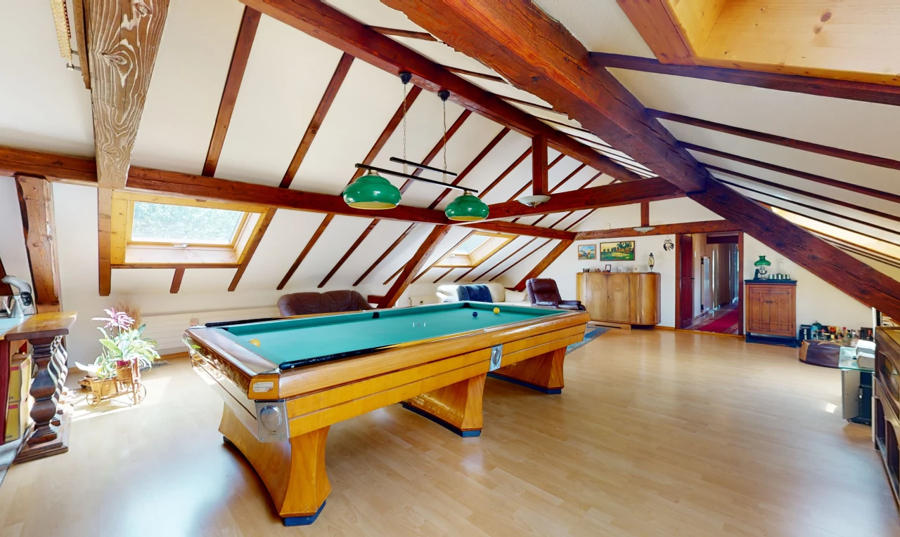 recreation room with vaulted ceiling with beams and wood-type flooring