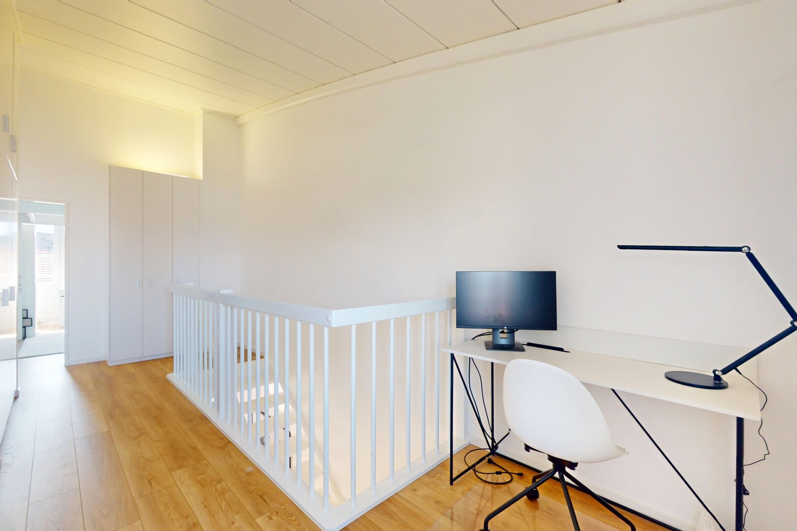 office space with light wood-style flooring