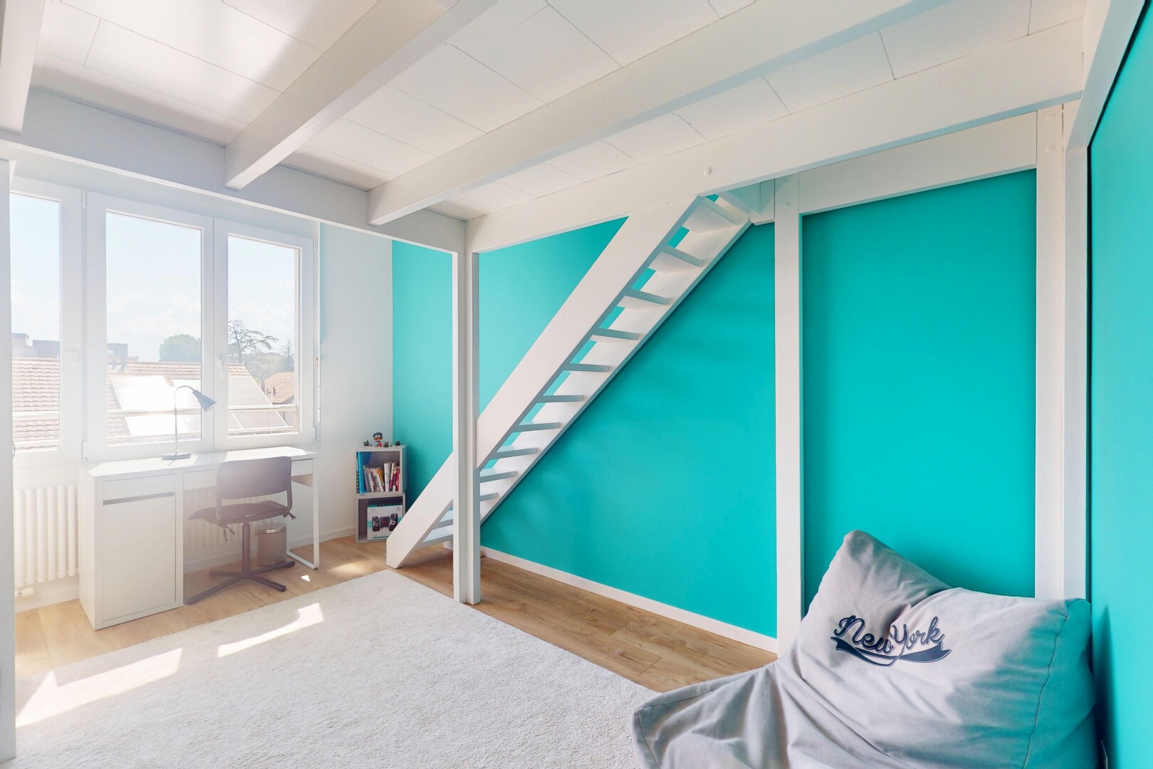 room featuring beam ceiling and wood finished floors