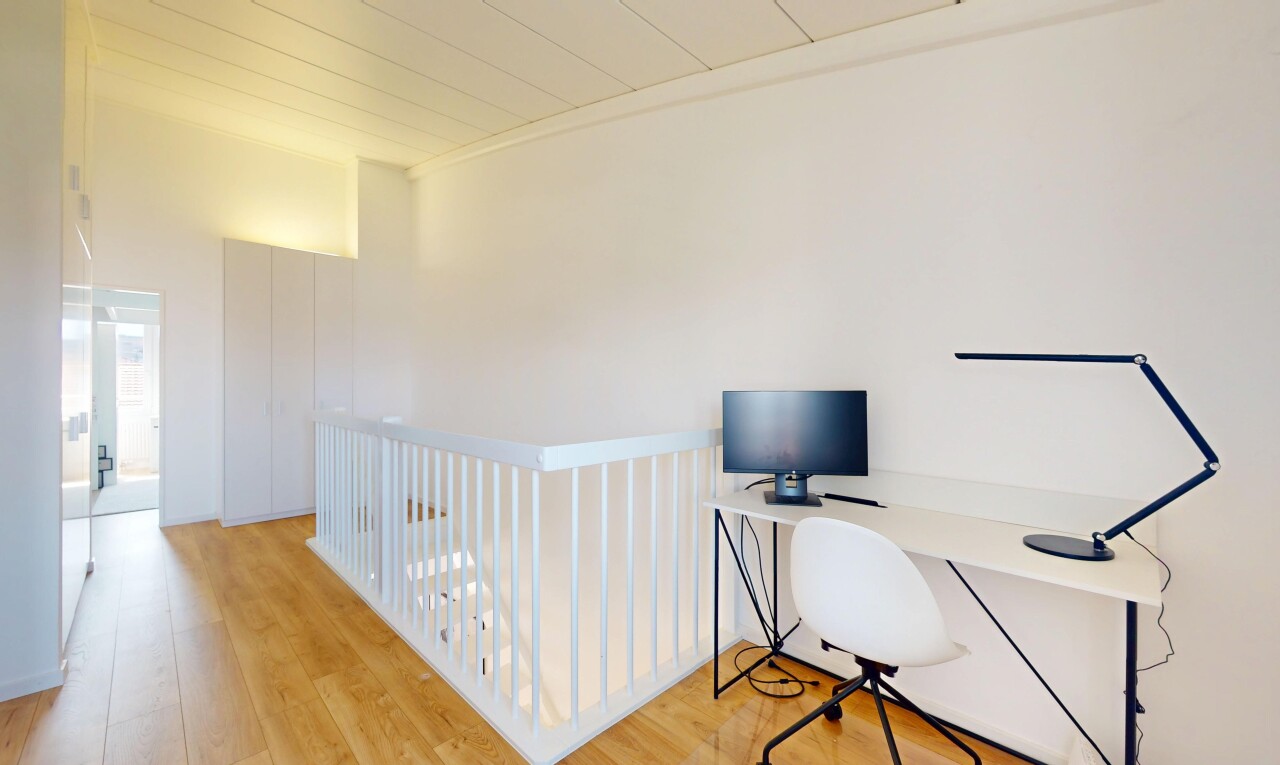 office space with light wood-style flooring