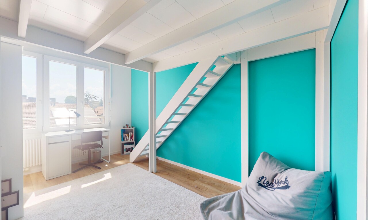 room featuring beam ceiling and wood finished floors