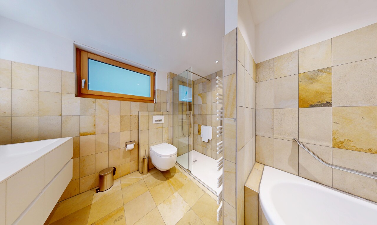bathroom featuring tile walls, a garden tub, a walk in shower, light tile patterned flooring, and recessed lighting
