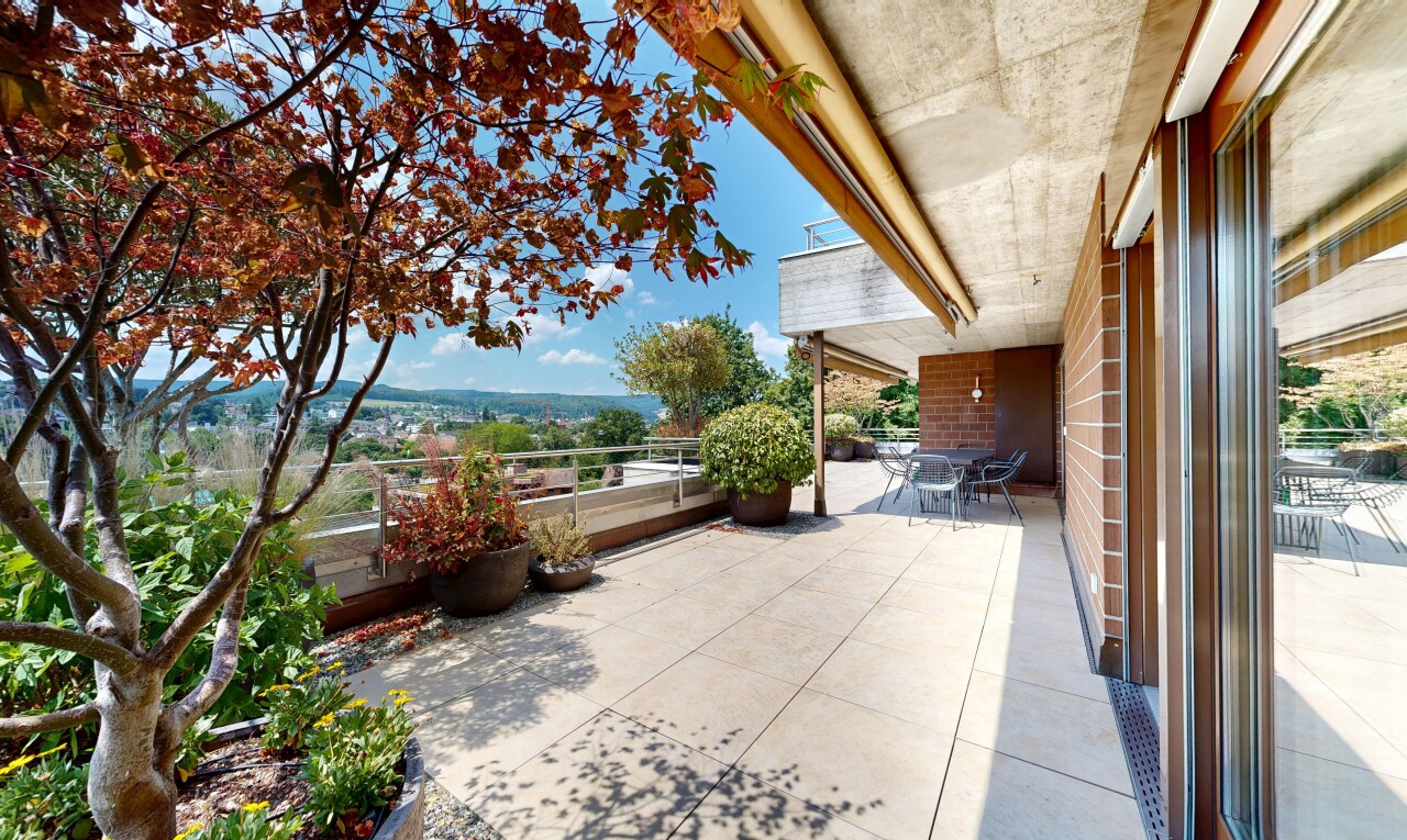 terrace with outdoor dining space and a patio