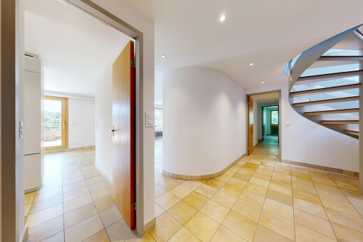 corridor featuring recessed lighting and light tile patterned floors