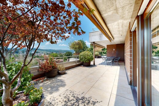 terrace with outdoor dining space and a patio