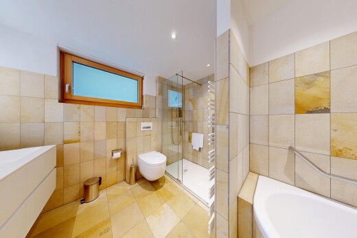 bathroom featuring tile walls, a garden tub, a walk in shower, light tile patterned flooring, and recessed lighting