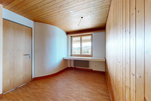 unfurnished room featuring wooden ceiling, wood finished floors, and radiator