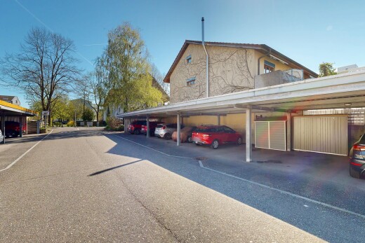 façade avec day time, parking, et from community