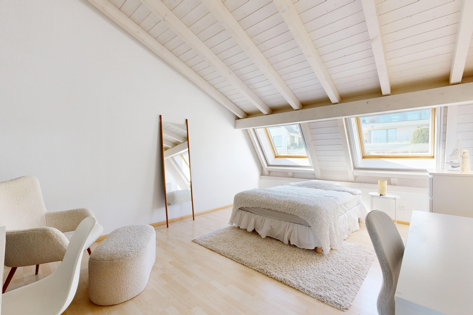 room / bedroom with light wood-style floors and lofted ceiling with beams