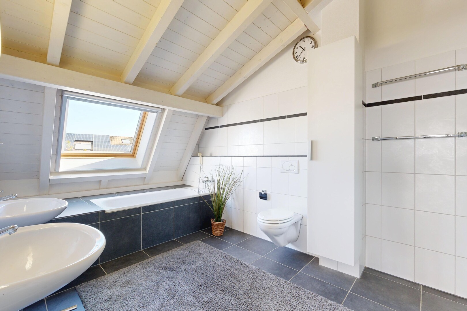 bathroom featuring lofted ceiling with beams, dark tile patterned flooring, and tile walls