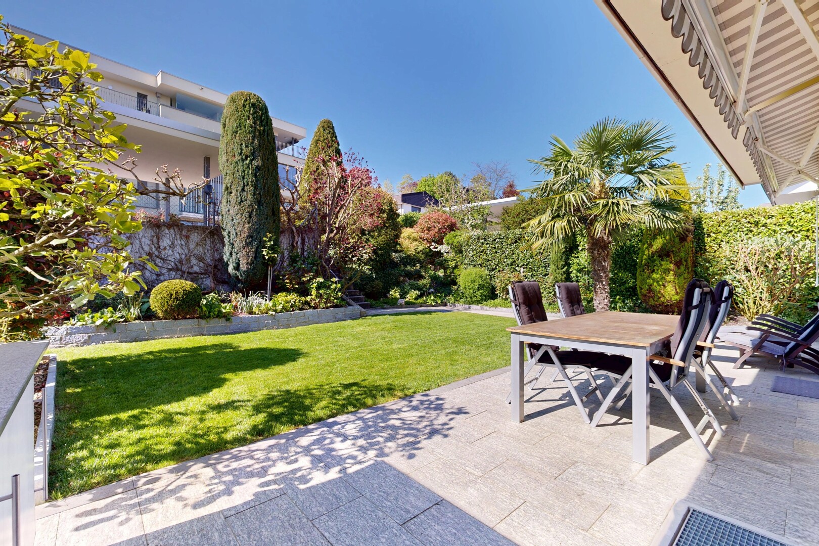 terrace with outdoor dining space and a patio area