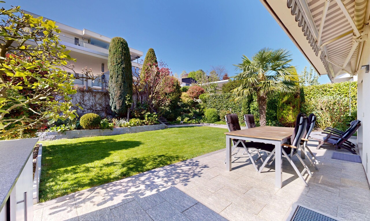 terrace with outdoor dining space and a patio area