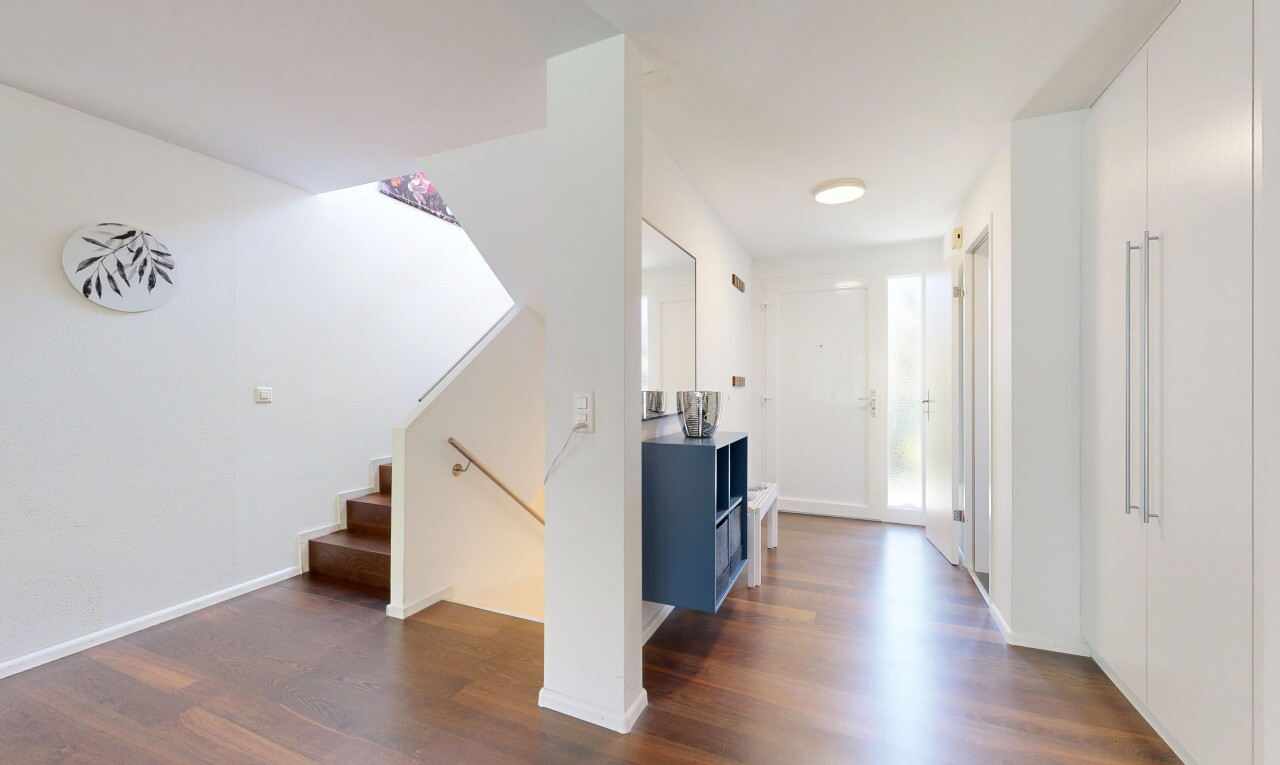 hall featuring dark wood-type flooring