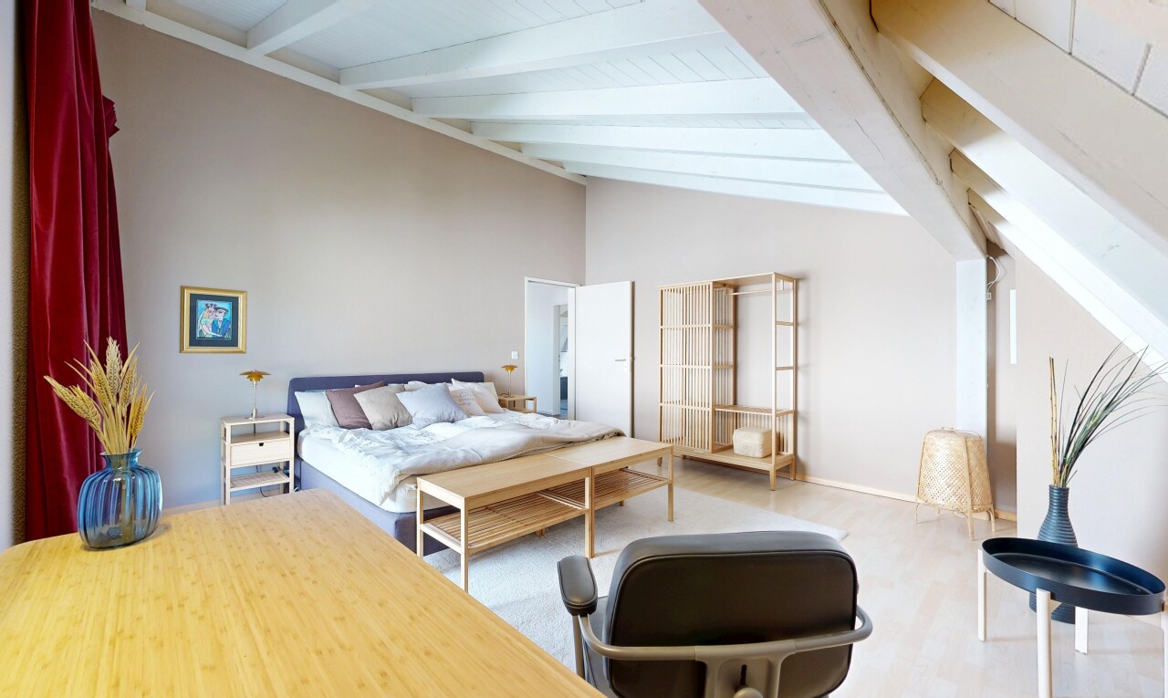 room featuring lofted ceiling and light wood-type flooring