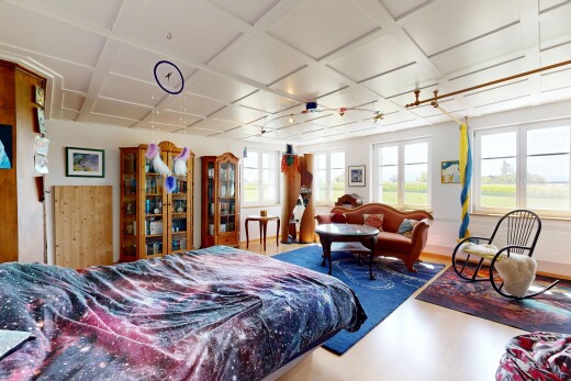room featuring coffered ceiling and rail lighting