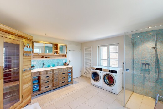 laundry area with a sauna, recessed lighting, washing machine and dryer, and light tile patterned flooring