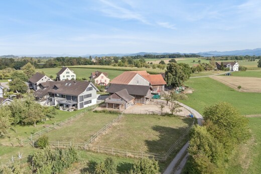 view of property with a view of countryside and a patio