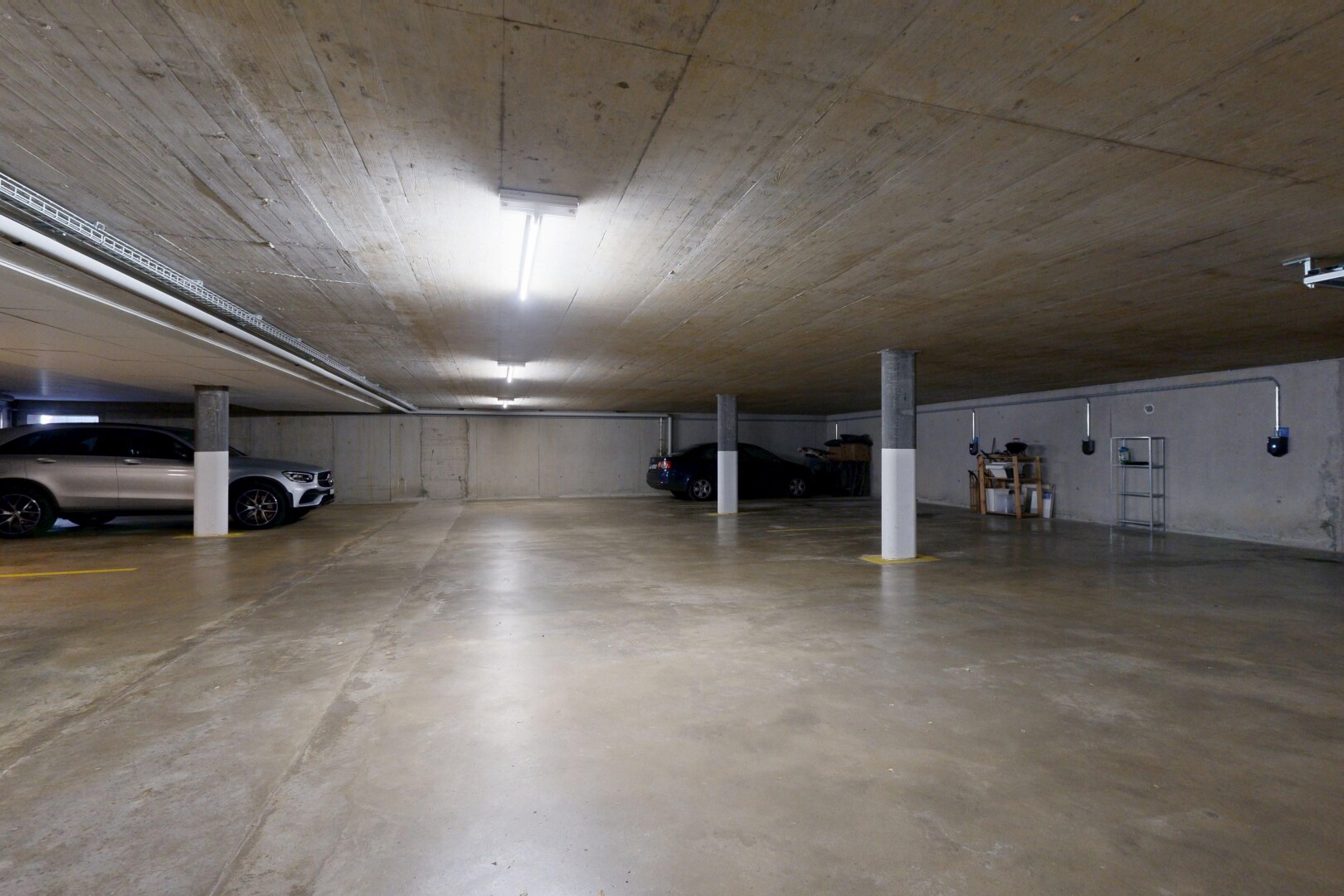 view of parking featuring a parking deck