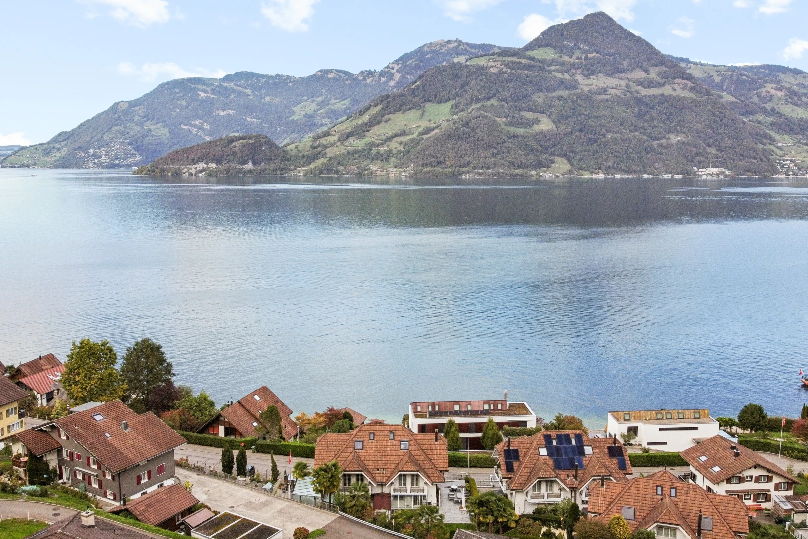 water view featuring nearby suburban area and a mountain backdrop