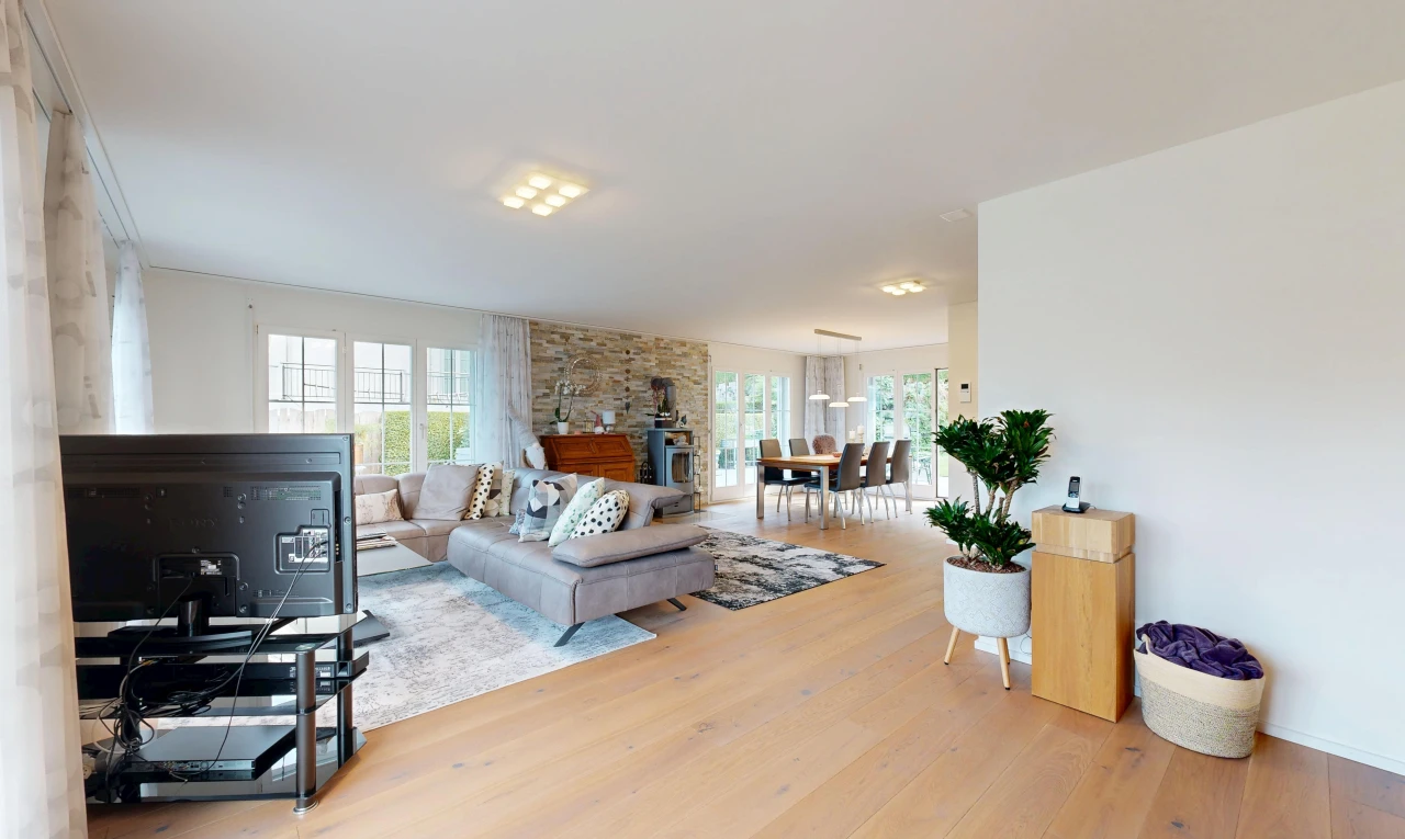 living / dining area featuring light wood-style flooring