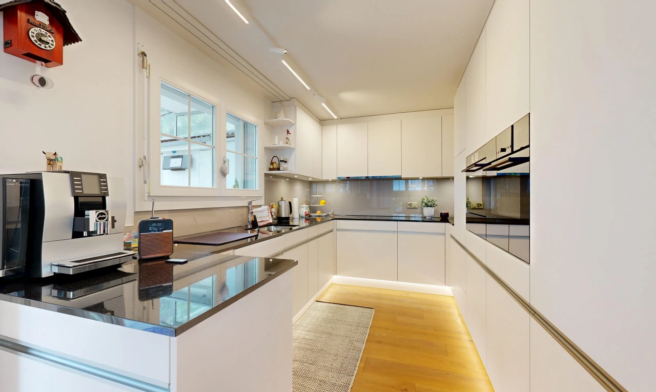 kitchen featuring open shelves, stainless steel oven, white cabinetry, modern cabinets, and a peninsula