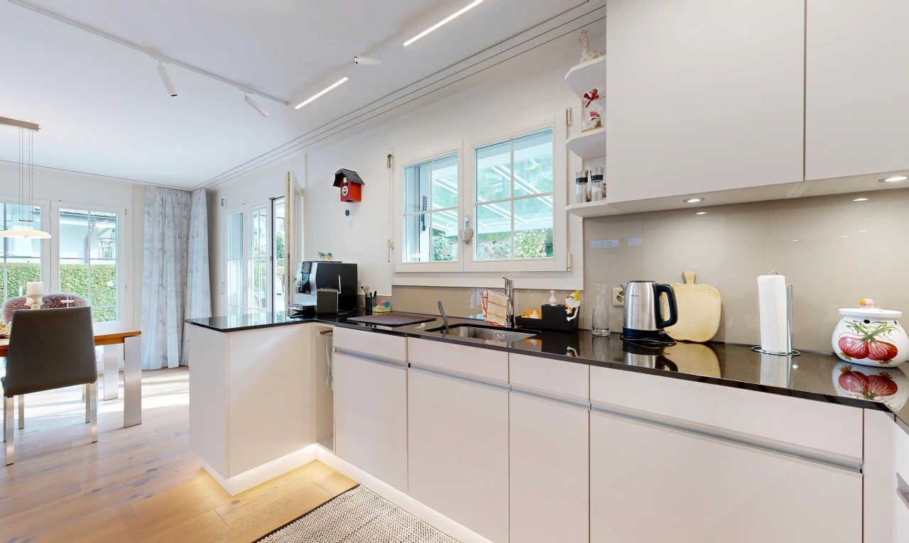 kitchen with white cabinets, open shelves, plenty of natural light, and light wood-style flooring