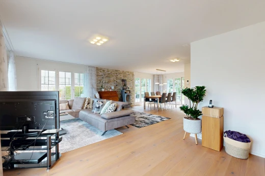 living / dining area featuring light wood-style flooring