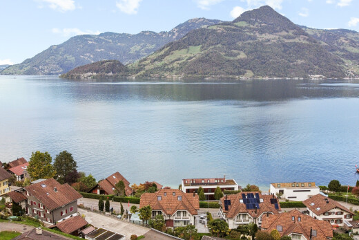 water view featuring nearby suburban area and a mountain backdrop