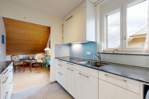 küche mit dark countertops, natürliches licht, natural light, white cabinets, und weiße schränke